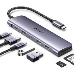 UGREEN 15214 CM195 7 in 1 USB-C to 2xUSB-A Çoklayıcı 1x4K/30Hz HDMI 1xUSB-C 3.2 1xSD 1xTF Kart Okuyucu 1xUSB-C PD 100W Şarj Desteği Çok Fonksiyonlu Bağlantı İstasyonu