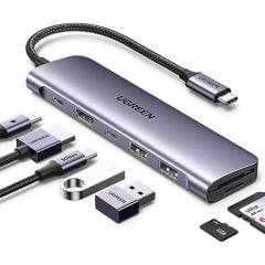 UGREEN 15214 CM195 7 in 1 USB-C to 2xUSB-A Çoklayıcı 1x4K/30Hz HDMI 1xUSB-C 3.2 1xSD 1xTF Kart Okuyucu 1xUSB-C PD 100W Şarj Desteği Çok Fonksiyonlu Bağlantı İstasyonu